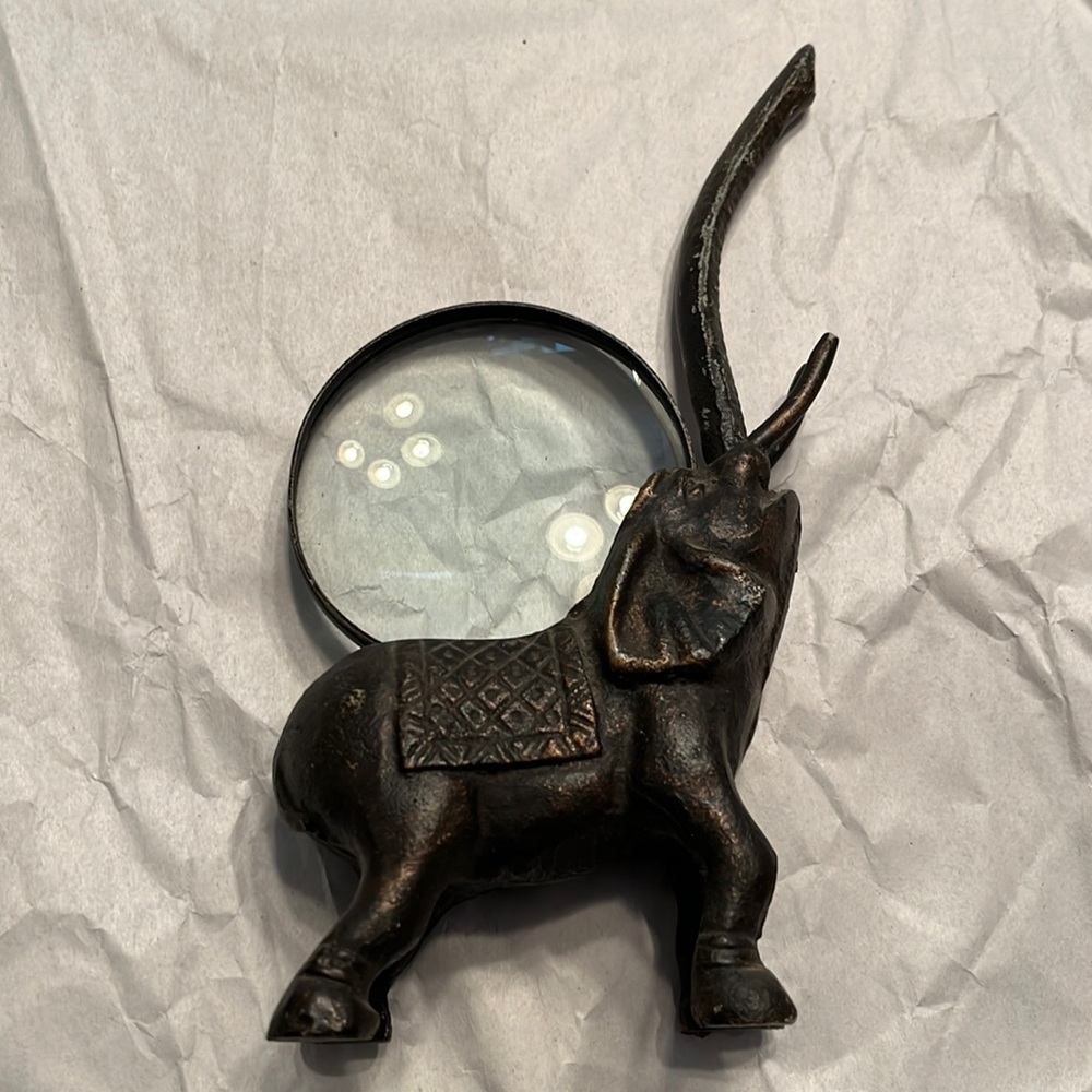 Pier one elephant with magnifying glass trunk